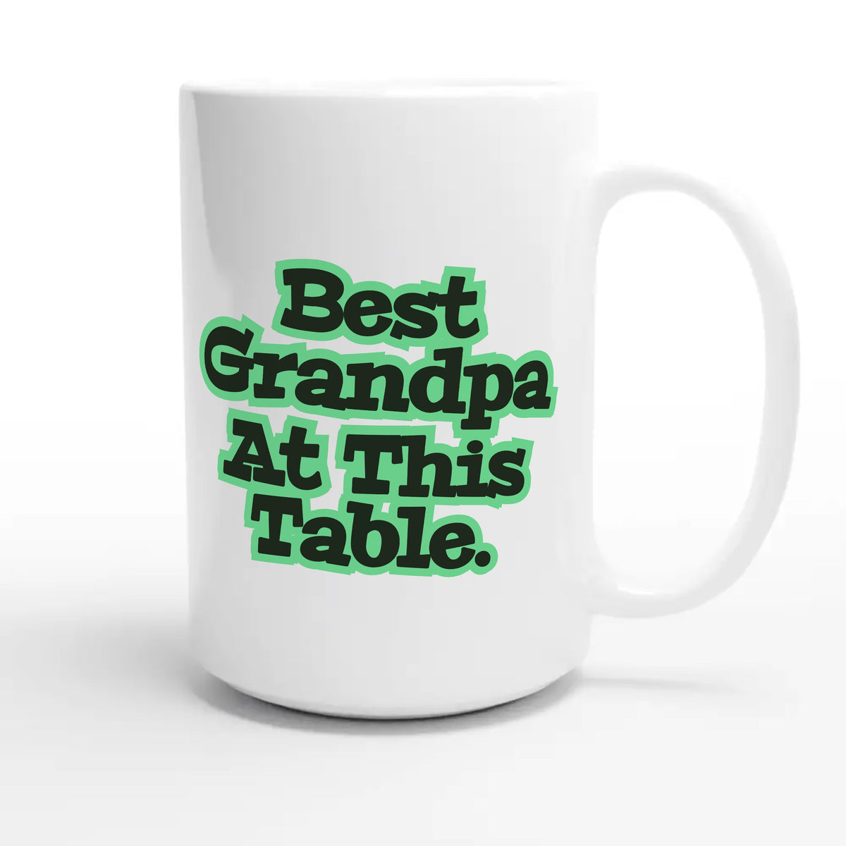 Best Grandpa At This Table — cute 15oz white coffee mug