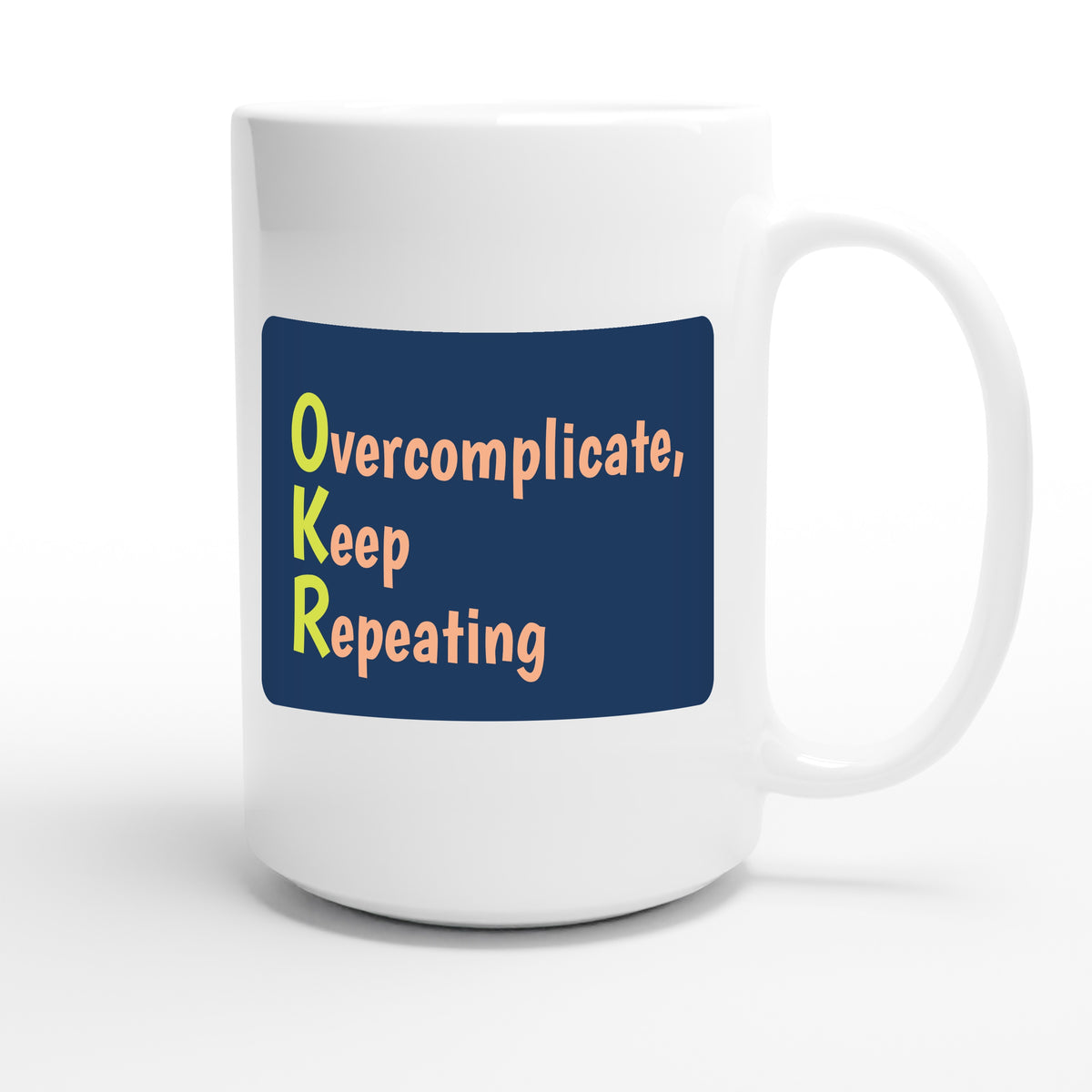 Overcomplicate, Keep Repeating — funny 15oz white coffee mug
