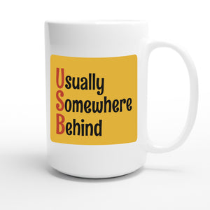 Usually Somewhere Behind — funny 15oz white coffee mug